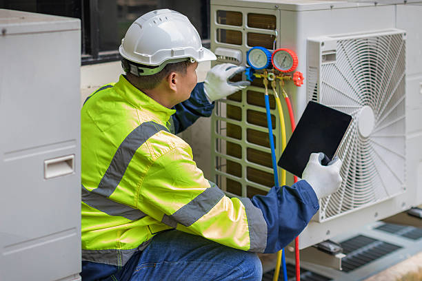 Professional Air Conditioning Repair technician working in Columbus, NE